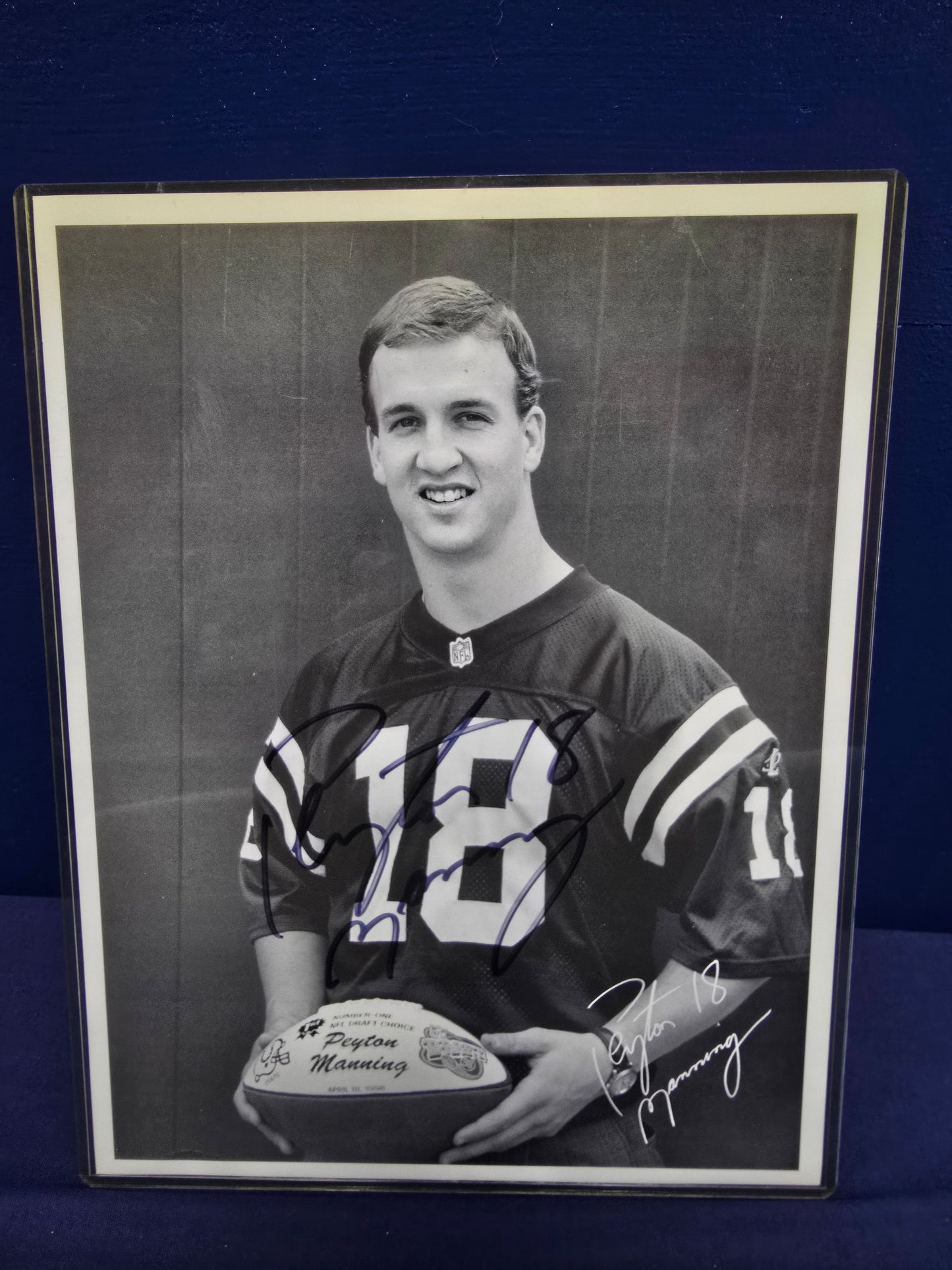 Payton Manning Autographed Portrait and Game program combo