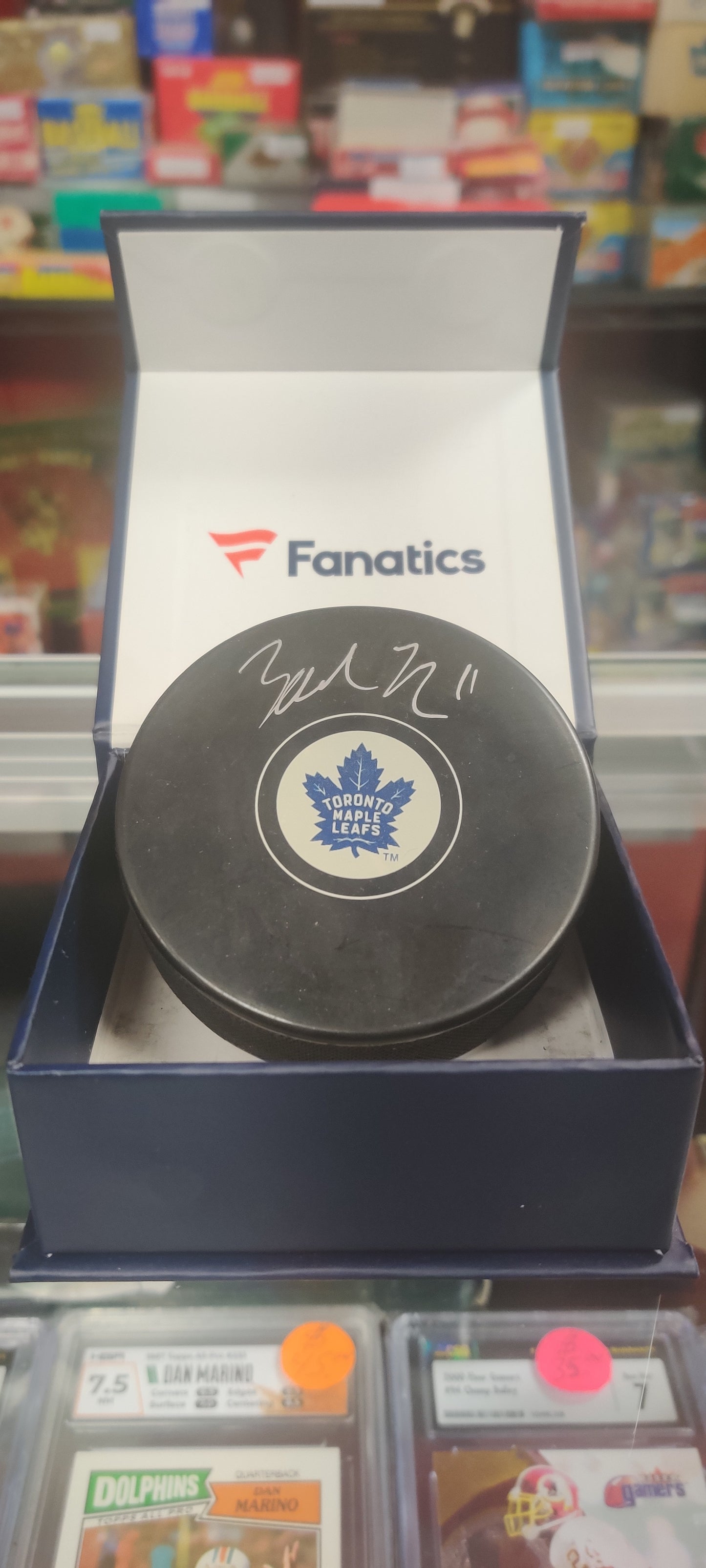 Hockey Puck signed by Zack Hyman
