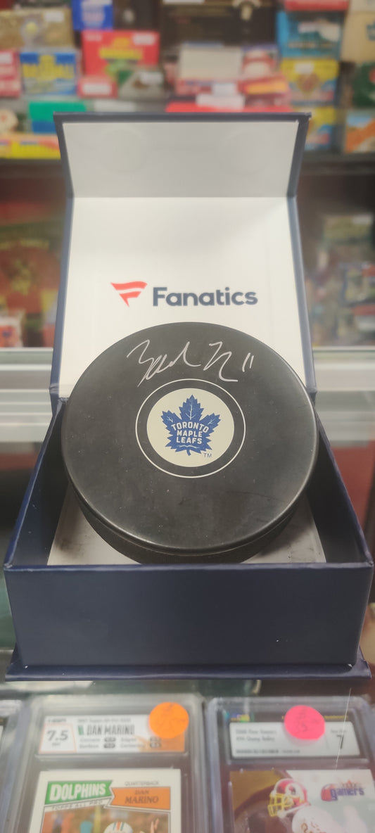Hockey Puck signed by Zack Hyman