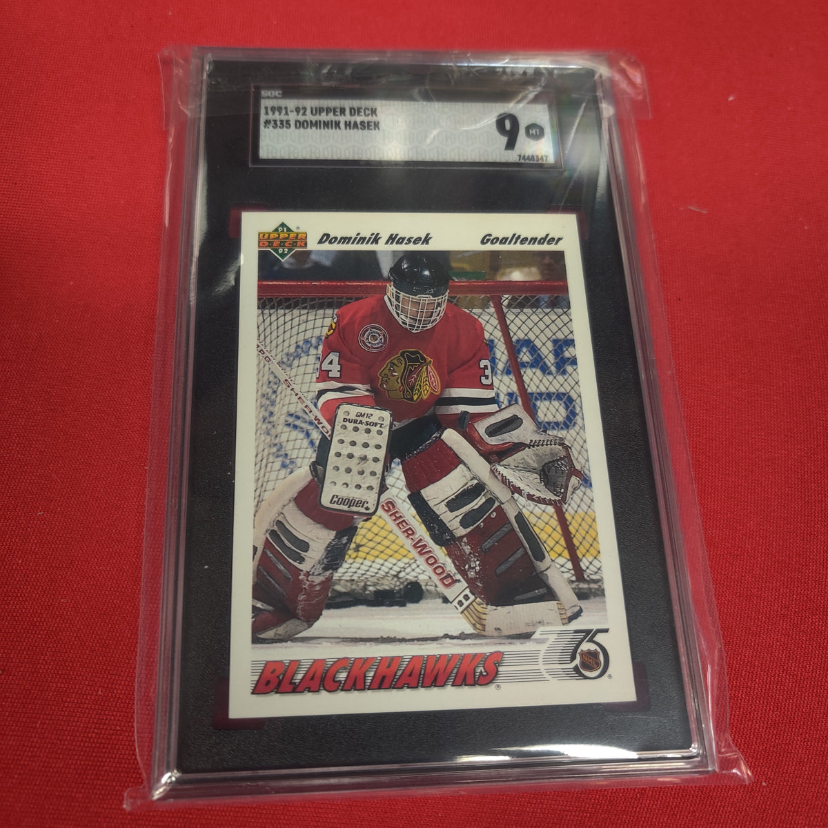 GRADED DOMINIK HASEN BLACKHAWKS HOCKEY CARD