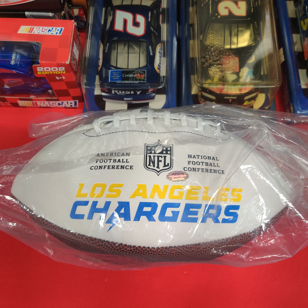 AUSTIN EKELER SIGNED FOOTBALL WITH COA
