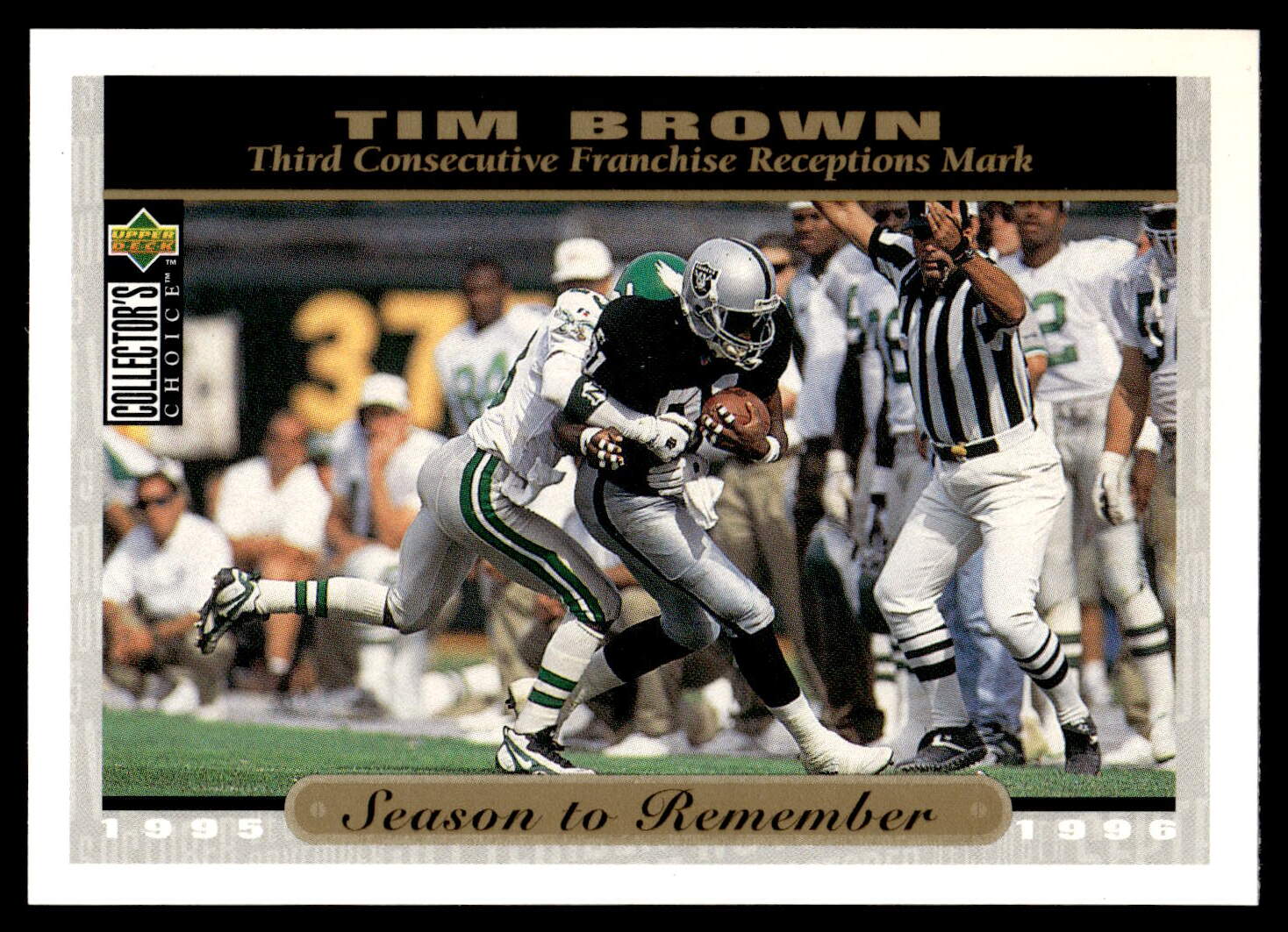 Football (Brand: Upper Deck) (Type: Collector's Choice) (Subtype: Season to Remember) (Hall of Famer: ) (Superstar: ) (Rookie: ) (Kind of Packaging: Semi-Rigid with Sleeve) (Year: 1996) (Unique Number: 70) (Numbered Card: ) (Player: Tim Brown)
